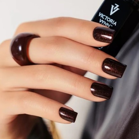  Gel Polish 483 Gilded Ebony manicura marrón oscuro con partículas doradas y acabado brillante